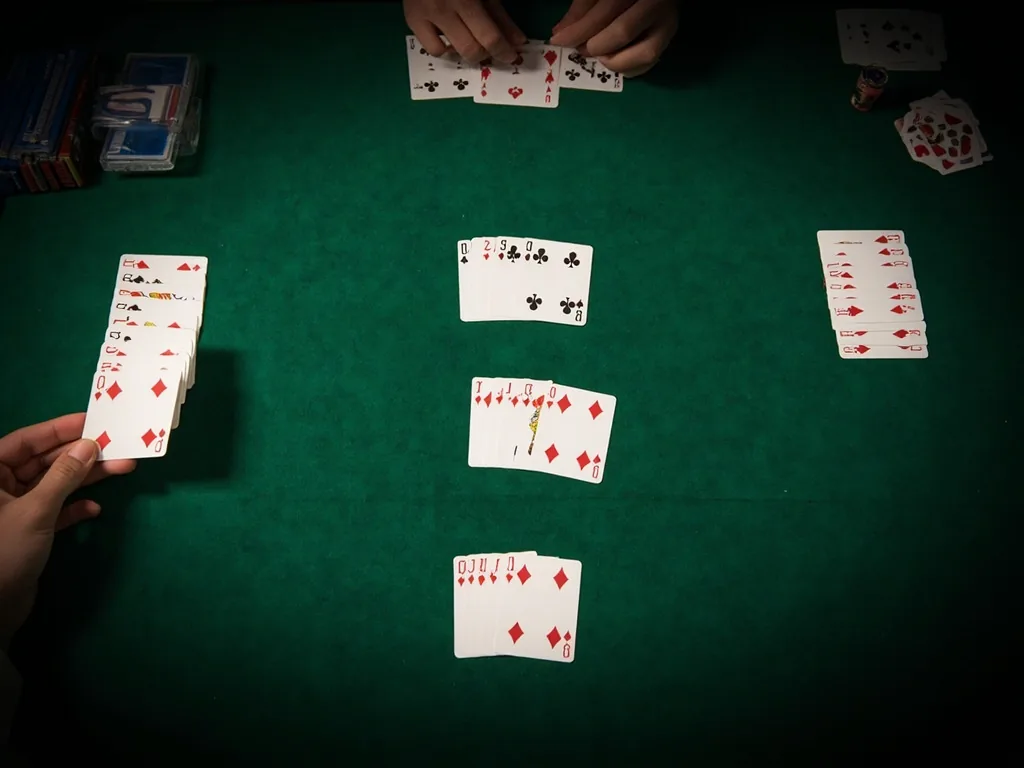Three-deck 21-card rummy spread